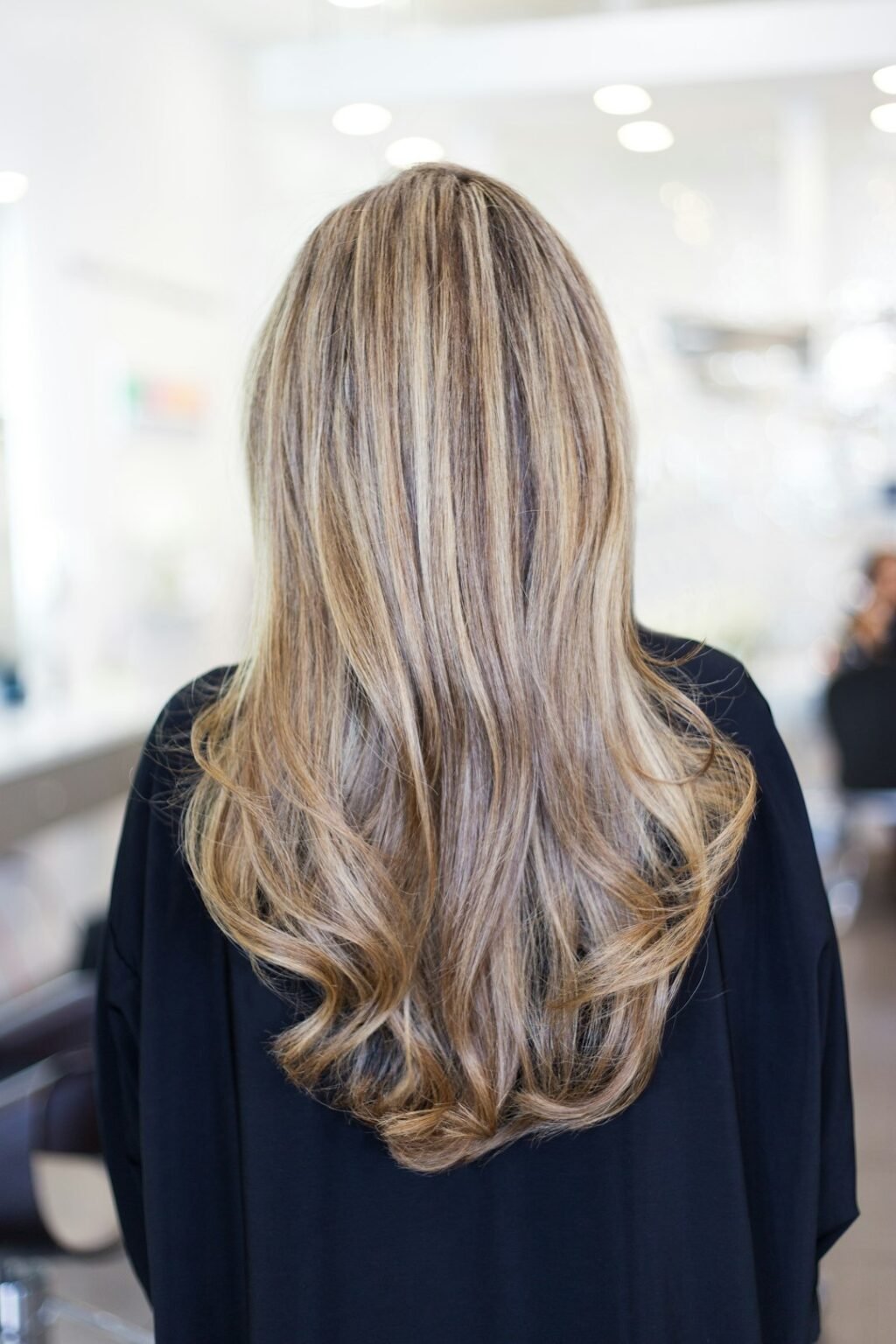 Woman with a voluminous butterfly cut